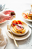 Pancakes with blood oranges and honey and lavenda