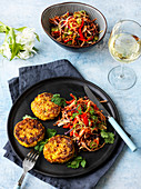 Potato and prawn fritters with oriental stir-fried vegetables
