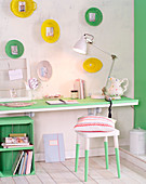 Pretty home study in fresh green with creative decorations