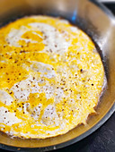 Scrambled egg in frying pan