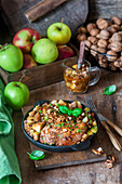 Chicken breast baked with apples and walnuts