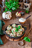 Stuffed baked mushrooms with chicken and cheese