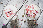 Latte macchiato with cardamom and rose petals