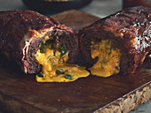 A bacon bomb (minced meat filled with cheese)