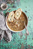French onion soup with cheese toasts and fresh thyme