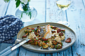 Fried cod fillet with cauliflower and mushrooms