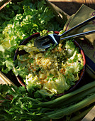 A green salad with egg and cheese