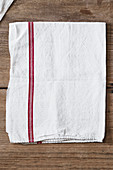 A tea towel on a wooden surface