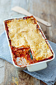 Lasagne with sausage bolognese and courgettes