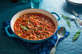 Pork and bean casserole with sage and tomatoes