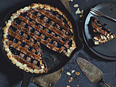 Linzer Torte (nut and jam layer cake) made in a cast-iron pan