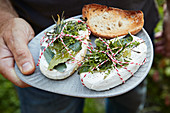 Camembert with fresh herbs and grilled bread