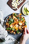 Sweet potato chips with pancetta, kale, shredded apples, and a sprinkle of smoked paprika