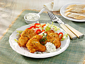 Deep-fried spicy cauliflower with a yoghurt and caper dip