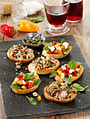 A duo of bruschetta with tuna and goat's cheese