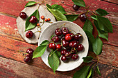 Fresh cherries with leaves