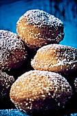 Mini doughnuts dusted with icing sugar