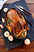 Roast duck with sweet potatoes and apple