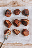 Baked lentil meatballs and fork placed on table