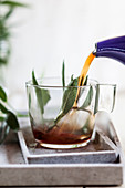 Meramieh tea (black tea with fresh sage) is poured into a cup