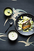 Fish fillet with lemongrass and lime sauce, and a frothy fennel sauce