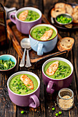 Green peas cream soup with fried salmon
