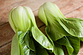 Pak choi on a wooden table