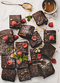 Brownies with caramel sauce and raspberries