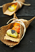 Spicy choux pastry in a jute wrap