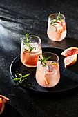 Pink tonic with grapefruit and rosemary