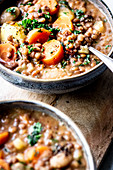 Vegetarian lentil soup with potatoes and carrots