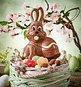 Chocolate bunny and sweets in an Easter basket