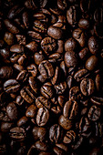 Macro photography of roasted coffee beans.