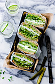 Green Goddess Sandwiches hand wrapped and served in a box