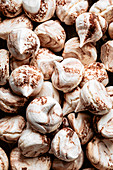 Closeup of bicolor chocolate meringues