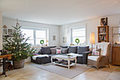 Christmas tree in basket in country-house-style living room