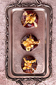 Ripe figs baked with cow's milk cheese, brie and camambert and sprinkled with bread crumbs