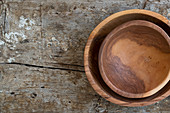 Wooden Bowls on Rustic Wood Background