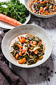 Bowls with fresh kale soup