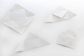 Folding paper into and envelope