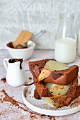 A chocolate loaf cake with sunken pears