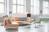 Apricot sofa set in bright interior