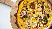 Quiche with cheese, mushrooms and leek
