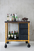 Rustic, Industrial-style serving trolley used as minibar