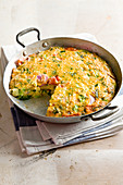Frittata with zucchini, tomatoes and herbs