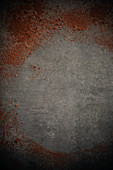Cocoa powder on a grey surface
