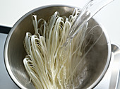 Glass noodles being cooked