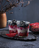 Red Moon apple compote with soya yoghurt and active charcoal sprinkles