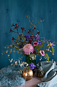 Autumn arrangement of chrysanthemums, calla lilies, gerbera daisies, monkshood, eucalyptus, clematis, kangaroo paw and sea lavender