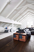 Chests with US flag in living room with bunks